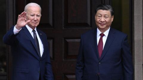 US President Joe Biden greets Chinese President Xi Jinping at last November's APEC summit.