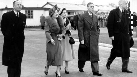 King George VI, Queen Elizabeth (later known as the Queen Mother) see off Princess Elizabeth and the Duke of Edinburgh.