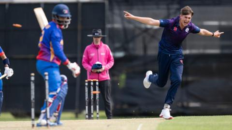 Mackenzie Jones celebrates after bowling Nepal opener Aasif Sheikh