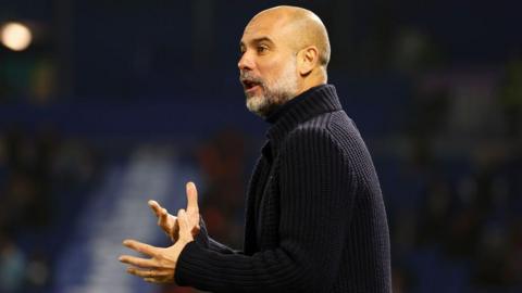 Pep Guardiola on the touchline