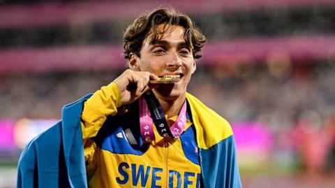 Armand Duplantis of Sweden with his men's pole vault gold medal during day seven of the European Athletics Championships 2026 at Alexander Stadium in Birmingham
