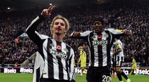Nick Woltemade celebrates with Anthony Elanga as he scores for Newcastle United against Tottenham
