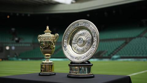 Wimbledon mens's and women's trophies.