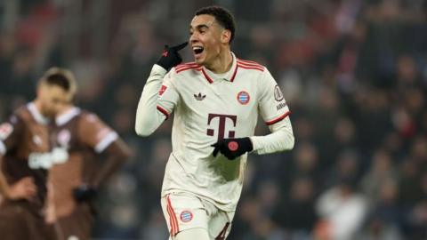 Jamal Musiala celebrates scoring for Bayern Munich against St. Pauli