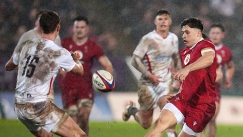 England and Wales compete for the ball