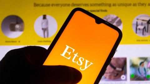 Etsy logo seen displayed on a smartphone.