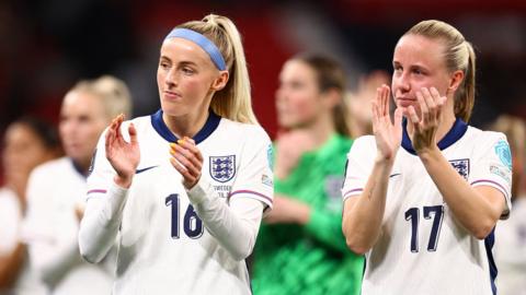 England's Chloe Kelly and Beth Mead clap the fans after their 1-1 draw with Sweden at Wembley