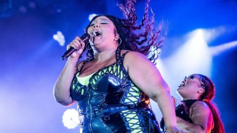 Lizzo performing on stage at Roskilde festival Denmark last month