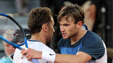 Jack Draper embraces Casper Ruud after their Madrid Open final