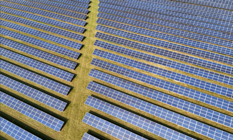 Solar panels on grass, as seen from above 