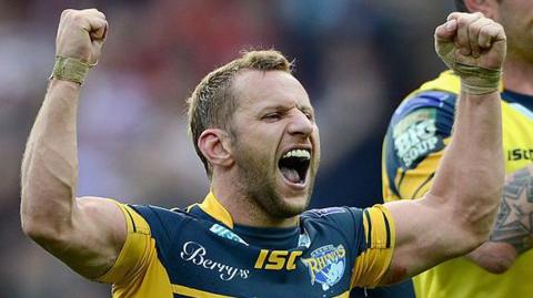 Rob Burrow celebrates winning a Challenge Cup match