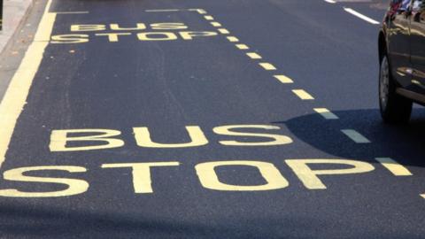 Bus stop painted on road