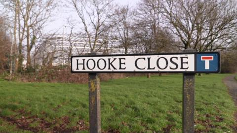 A sign for Hooke Close in Corby