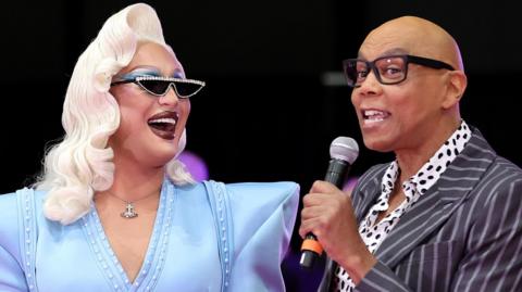 The Vivienne and RuPaul attend the Pink Ribbon Cutting with the cast of RuPaul's Drag Race All Stars Season 7 RuPaul's Los Angeles DragCon at Los Angeles Convention Center on May 13, 2022 in Los Angeles, California.