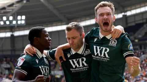 Blackburn celebrate their opening goal at Hull 