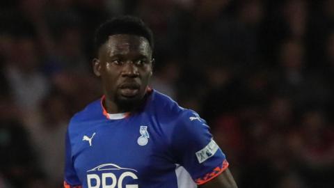 Mike Fondop in action for Oldham Athletic