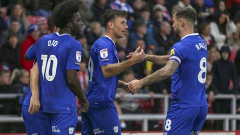 Mark Harris congratulated after scoring