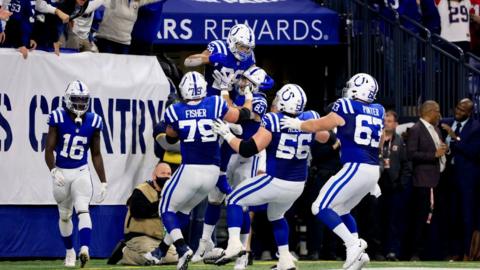 The Colts celebrate Jonathan Taylor's winning touchdown