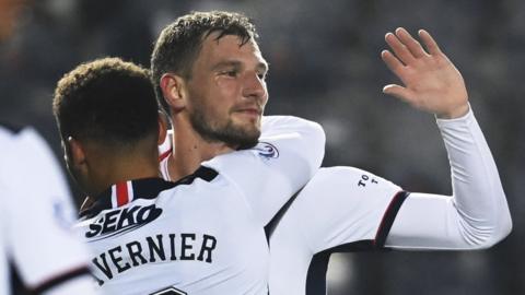 Borna Barisic and James Tavernier celebrate