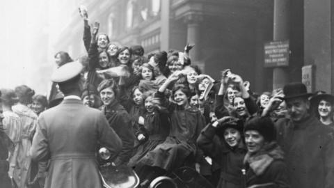 People celebrating Armistice in London