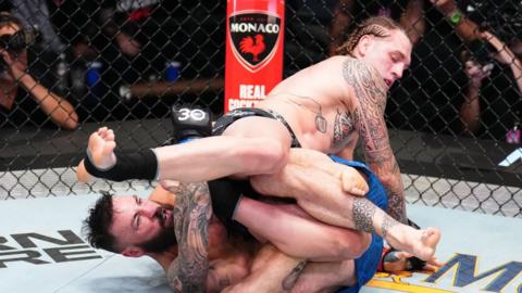 Paul Craig of Scotland works for a submission against Brendan Allen in a middleweight fight during the UFC Fight Night event in Las Vegas, Nevada.