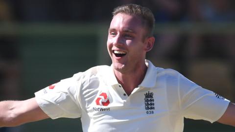 Stuart Broad celebrates taking a wicket for England