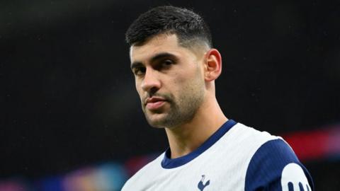 Cristian Romero in action for Tottenham against Chelsea