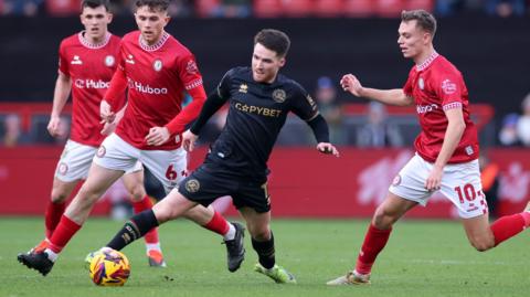 QPR goalscorer Paul Smyth is surrounded by Bristol City players in the draw at Ashton Gate 