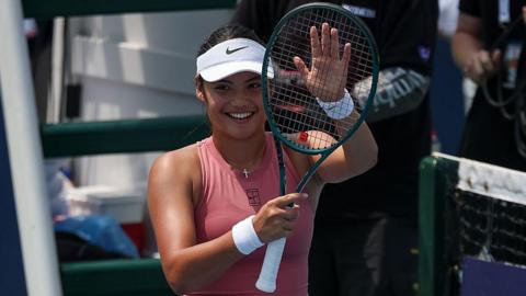 Emma Raducanu applauds the crowd