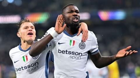 Marcus Thuram celebrates scoring for Inter Milan