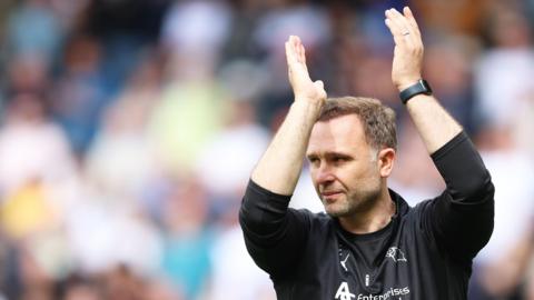 John Eustace claps his hands after Derby secure Championship safety with a draw with Stoke