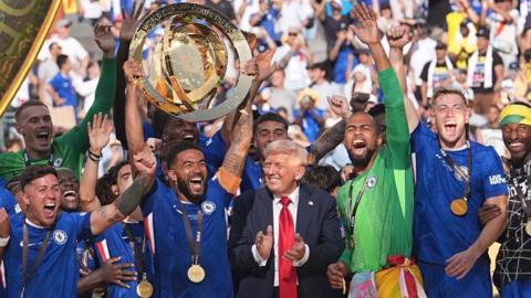 Donald Trump celebrates with Chelsea players after their Fifa Club World Cup victory
