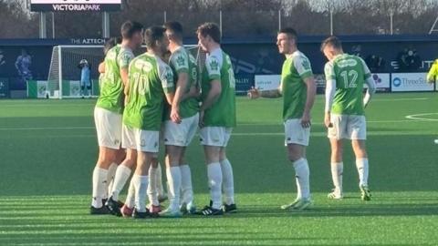Fin Patterson celebrates his third goal of the season for Guernsey FC