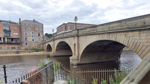 A view of Ouse Bridge in York from the riverside