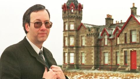 Kevin Booth pictured outside Lochdhu Lodge