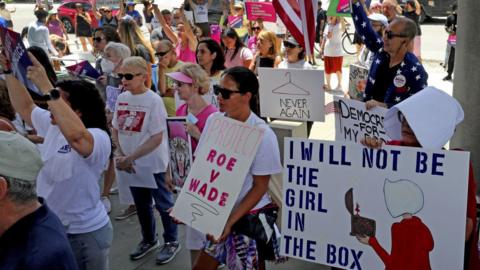 People gather on the steps of the Federal Courthouse in Fort Lauderdale on May 7, 2022 for a rally to support abortion rights. Planned Parenthood is planning 15 Florida rallies on Saturday, May 14, including one at the Federal Courthouse in Fort Lauderdale.