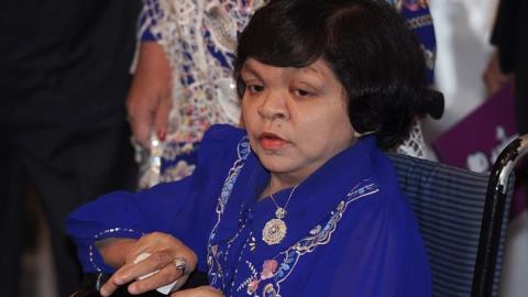 ET, Myanmar's most famous fortune teller, sits on a wheelchair as she attends a local television program in Bangkok on 23 July 2012.