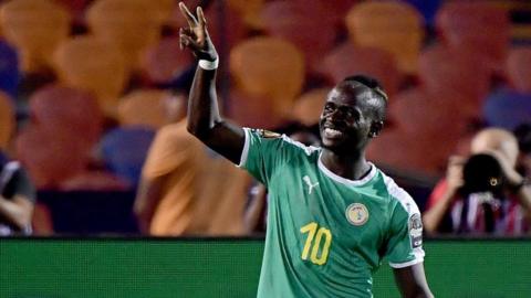 Sadio Mane celebrates scoring for Senegal against Uganda at the Africa Cup of Nations