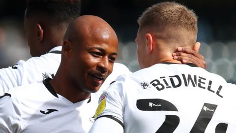 Andre Ayew and Jake Bidwell