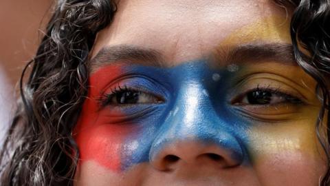 A demonstrator looks on during a protest against election results that awarded Venezuela's President Nicolas Maduro with a third term, in Caracas, Venezuela, August 3, 2024.