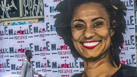 A wheat-paste piece of street art by artist Luis Bueno shows the councilwoman from Rio de Janeiro Marielle Franco.