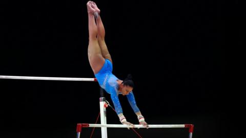 Rebecca Downie on uneven bars