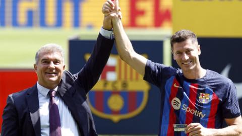 Barcelona president Joan Laporta and new signing Robert Lewandowski