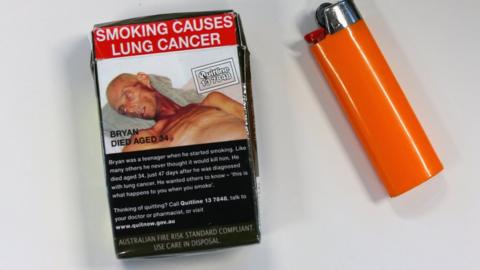 An Australian cigarette packet and a lighter