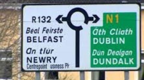 Road sign showing Belfast and Dublin