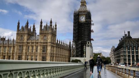 People walking outside Parliament