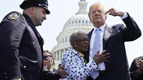 Trump consoles the 90-year-old mother of a slain police officer