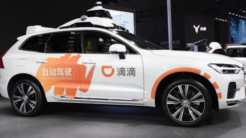 A DiDi autonomous driving car displayed on the Volvo booth during the 19th Shanghai International Automobile Industry Exhibition