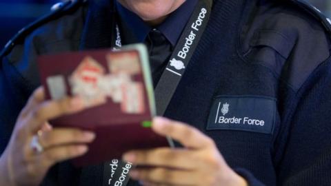 Passport control at Heathrow airport (04 August 2014)