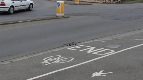 Pavement, cycle lane and road